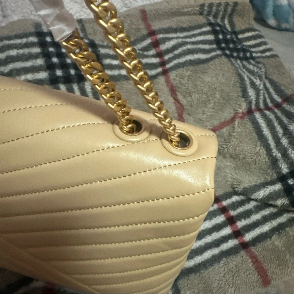 Tory Burch in the color desert dune 
Style Kira chevron convertible shoulder bag - Picture 6 of 12